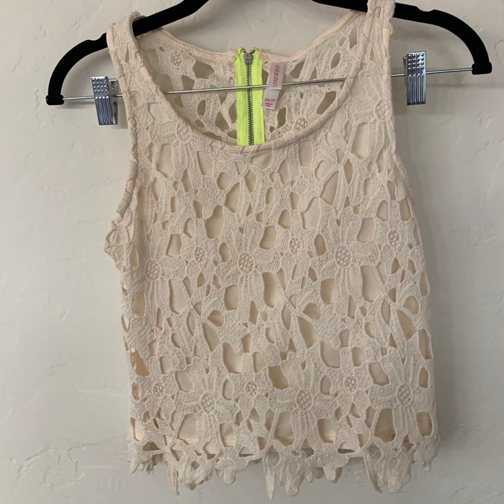 Cream crop top with neon green accents